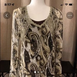 Beautiful sheer long sleeve blouse.